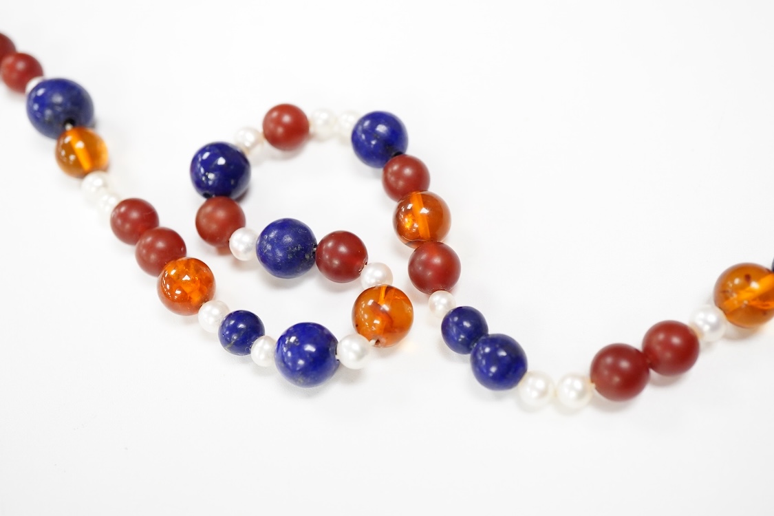 A 20th century Italian lapis lazuli, amber and pearl bead necklace (pearls no tested), with 925 clasp, 124cm.